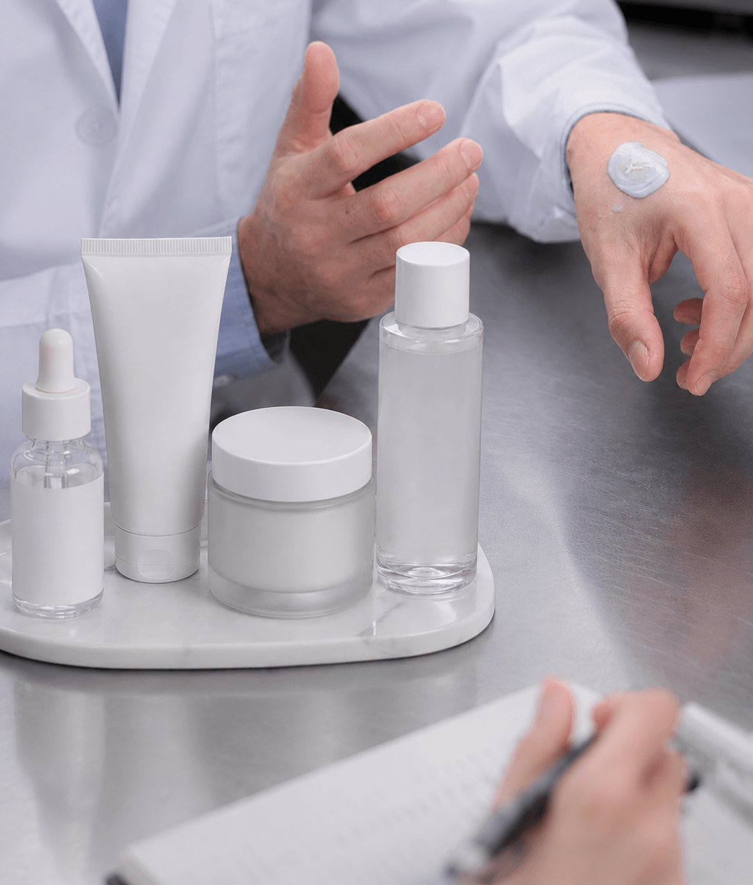 Lab-coated chemist testing blue cream with hyaluronic acid on hand, surrounded by minimalist skincare packaging and glass dropper bottle
